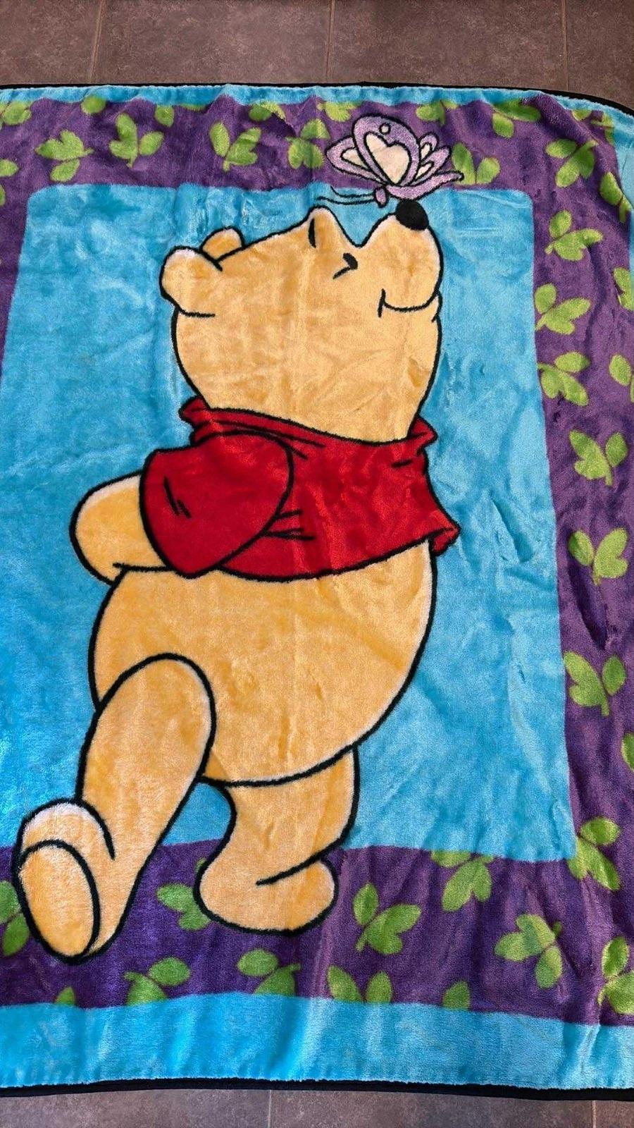 ヴィンテージ くまのプーさんと蝶の青いぬいぐるみベビー