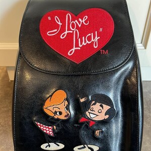 i love lucy mini backpack Flower Child – Darling Show your love for the Big Apple with this fun Loungefly mini backpack I Love Lucy Backpack/Shoulder Bag
