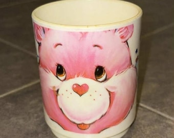 1986 De där karaktärerna från Cleveland Care Bear Gailourson 30 cl plastmugg