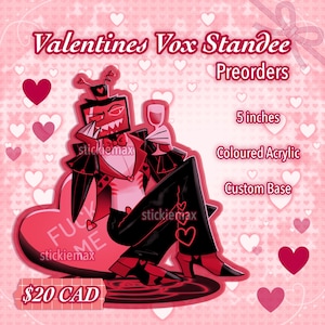 Może przedstawiać: Stojak walentynkowy z czerwoną i czarną postacią na podstawie w kształcie serca. Stojak ma 12,7 cm wysokości i jest wykonany z kolorowego akrylu. Podstawa zawiera napis "FUCK ME".