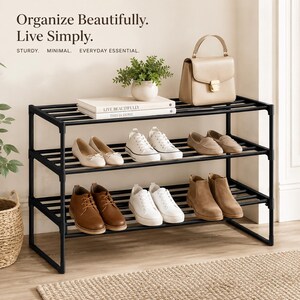 May include: A black metal shoe rack with three tiers, holding various shoes, a beige handbag, and a small potted plant. The text "Organize Beautifully. Live Simply." is visible, along with "STURDY. MINIMAL. EVERYDAY ESSENTIAL."