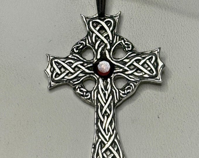 Silver Celtic cross engraved with Celtic knot and set with garnet