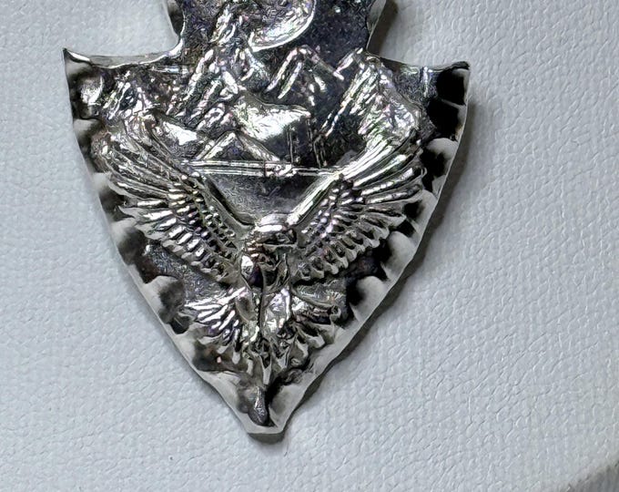 Silver Arrow Head with Eagle with Moon over Mountain engraved in base 1-1/2" x 1-1/4"