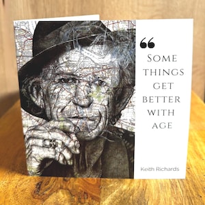 May include: A greeting card with a portrait of Keith Richards, integrated with a map design. The card displays the quote "SOME THINGS GET BETTER WITH AGE" and the name "Keith Richards" in white text on a white background.