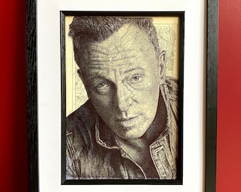 Portret inspirowany Bruce'em Springsteenem. Rysunek piórem na mapie New Jersey. Format A4, bez ramki.
