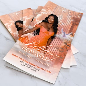 Puede incluir: Varias tarjetas conmemorativas con una mujer con un vestido naranja, sobre un fondo de nubes y una puerta. Las tarjetas muestran el nombre "Bethany Howard" y fechas. También se ve el texto "In Loving Memory Of".