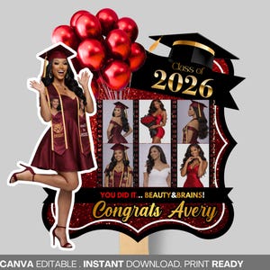 May include: A graduation-themed photo prop featuring a woman in a maroon dress and cap, with red balloons. The design includes the text "Class of 2026," "You Did It... Beauty & Brains!" and "Congrats Avery."