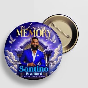 May include: A round button with a blue and gold design, featuring a portrait of a man in a blue suit. The text reads "In Loving Memory Of Santino Bradford Forever in Our Hearts". Includes doves and clouds.