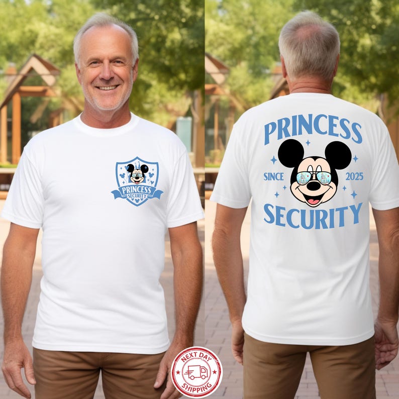 May include: White t-shirt with a blue and black Mickey Mouse graphic. The front of the shirt features a shield design with the words "Princess Security." The back of the shirt has a larger Mickey Mouse graphic and the words "Princess Security Since 2025."
