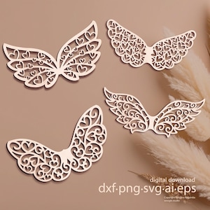 Puede incluir: Cuatro formas de alas de madera cortadas con láser con intrincados diseños de corazones y espirales. Las alas, en varios tamaños y orientaciones, son ideales para proyectos de manualidades. La imagen incluye el texto "digital download dxf.png.svg.ai.eps".