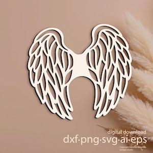 May include: A cream-colored, laser-cut angel wings design with intricate feather detailing. The wings are set against a neutral background. The image includes the text "digital download" and file type extensions: dxf, png, svg, ai, and eps.