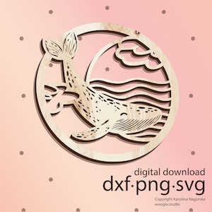 May include: A wooden whale design, laser cut in a circular frame, featuring a whale breaching the water with a sun and clouds. The design includes the text "digital download dxf.png.svg".