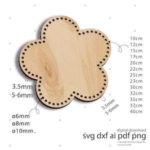 Peut inclure: Une base en bois en forme de fleur avec une série de trous espacés régulièrement sur le pourtour. Les mesures sont indiquées en centimètres et en millimètres. L'image comprend également le texte "téléchargement numérique" et les options de type de fichier.