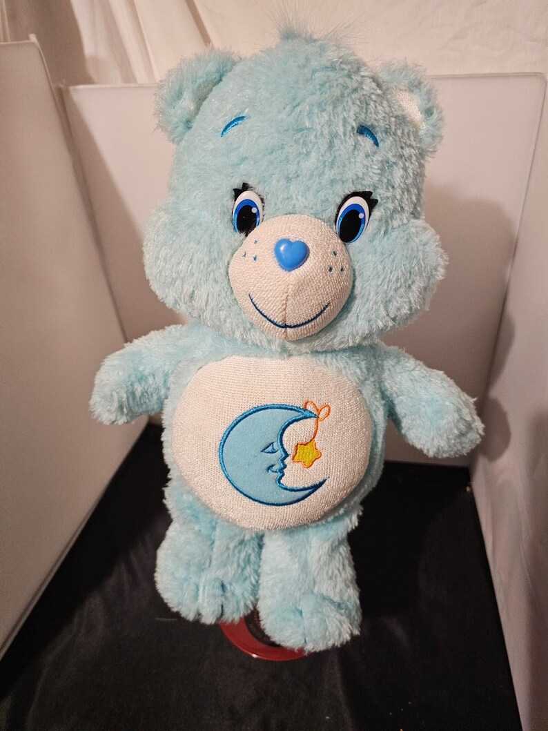 2015 Bisounours bleu clair en peluche en peluche de 33 cm 13 po. bleu clair Q1 image 1