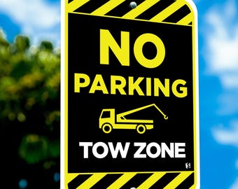 No Parking, Tow Away, Under Surveillance Signs. 12" x 18" single sided. Metal or plastic.