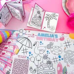May include: A collection of pink party supplies, including coloring pages, a cupcake, and a plate. The coloring pages feature line drawings of a cake, flamingo, and other summer-themed images. The text "AMELIA'S BIRTHDAY" is visible.