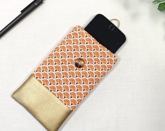 May include: A gold and orange phone case with a geometric pattern. The case has a button closure and a gold leather trim.