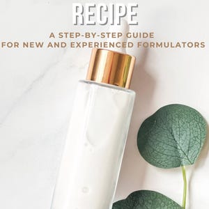 May include: A skincare product image featuring a clear glass bottle with a gold cap, filled with a milky white serum. The text "MILKY SERUM RECIPE" is at the top, with "A STEP-BY-STEP GUIDE FOR NEW AND EXPERIENCED FORMULATORS" below. Green leaves are in the background.