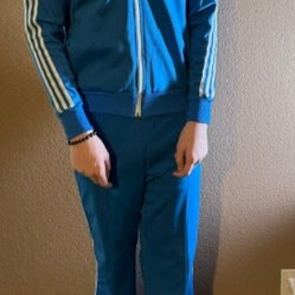 Vintage Adidas track suit with the original logo