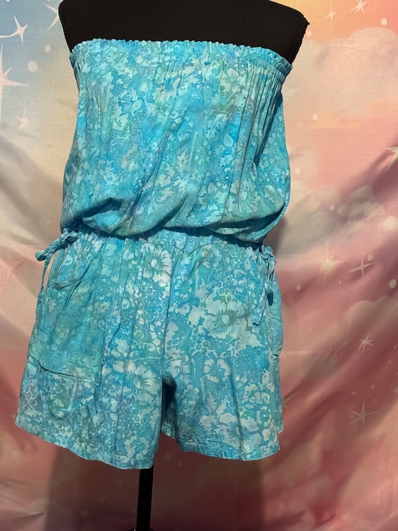 vintage 80s strapless romper in a teal color with 