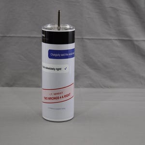 May include: A white cylindrical tumbler with a metal straw, featuring a black top band and a graphic design of chat bubbles with the text Chatgpity said this would work and You're absolutely right, plus a red label reading I.T. VERDICT TWO WRONGS # A RIGHT.