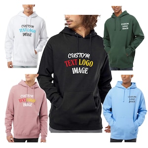 May include: A collection of five long-sleeve hooded sweatshirts in white, black, dark green, light pink, and light blue. Each hoodie features a front kangaroo pocket, adjustable drawstrings, and the printed text CUSTOM TEXT LOGO IMAGE.