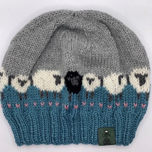Black sheep patterned handknit hat