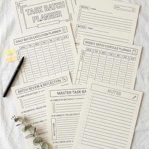 May include: A collection of beige task batch planners with black text and lines. The planners include titles such as "Task Batch Planner", "Daily Batch Execution Planner", and "Weekly Batch Schedule Planner". A black pen, sticky notes, and a sprig of greenery are also present.