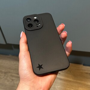 iPhone 15 14 13 12 11 11 Pro Max Mini 7 8 XR XS X 用ブラックスター電話ケース、かわいい星柄の耐衝撃電話カバー