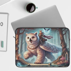 May include: A laptop sleeve featuring a white owl with a cat-like character riding on its back. The owl is in a forest setting with trees and foliage. The sleeve has a blue and green color scheme.