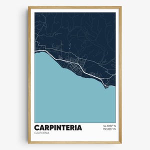 May include: A blue and white map print of Carpinteria, California. The map shows the city's streets and coastline. The text "Carpinteria, California" and the coordinates "34.3989° N 119.5185° W" are printed below the map.
