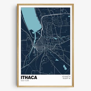 May include: A dark blue map print of Ithaca, New York, with a light blue lake and white lines showing the roads and streets. The city name "ITHACA" and "NEW YORK" are printed in white at the bottom of the map. The coordinates "42.4440° N 76.5019° W" are printed in white at the bottom right corner of the map.