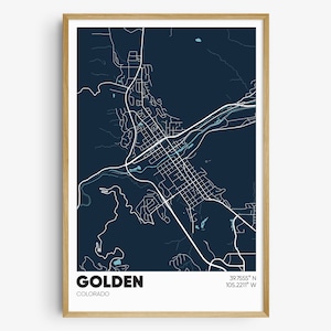 May include: A minimalist map print of Golden, Colorado, with a dark blue background and white lines showing the city streets. The city name and coordinates are printed in white at the bottom of the map.