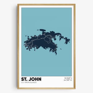 May include: A minimalist map print of St. John, U.S. Virgin Islands, with a blue background and dark blue island outline. The map includes roads and the coordinates 18.3348° N 64.7281° W.