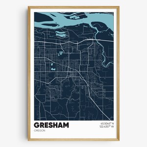 May include: A framed map print of Gresham, Oregon, in a minimalist style. The map features a dark blue background with white lines representing roads and waterways, and a light blue area for the river. The city name and coordinates are displayed in white.