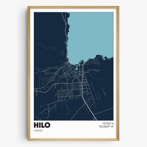May include: A dark blue and light blue map print of Hilo, Hawaii. The map shows the city streets and coastline. The text "HILO" and "HAWAII" are printed at the bottom of the map. The coordinates "19.7216° N 155.0849° W" are printed in the top right corner.