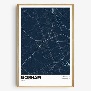 May include: A dark blue map print of Gorham, Maine with white lines showing the streets and roads. The coordinates 43.6795° N 70.4442° W are printed in the bottom right corner.