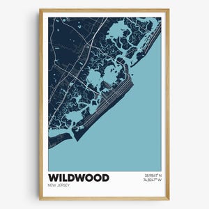 May include: A blue and white map print of Wildwood, New Jersey. The map shows the city's streets and waterways. The text "WILDWOOD" and "NEW JERSEY" is printed below the map. The coordinates "38.9841&deg; N 74.8247&deg; W" are printed in the top right corner.