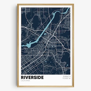 May include: A dark blue map print of Riverside, California, with white lines showing the streets and a light blue river. The text "RIVERSIDE" and "CALIFORNIA" are printed in white at the bottom of the map. The coordinates "33.9806° N 117.3755° W" are printed in white in the bottom right corner.
