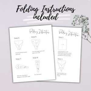 May include: A set of instructions for folding a paper craft. The instructions are written in black ink on a white background. The steps are numbered and illustrated with diagrams.