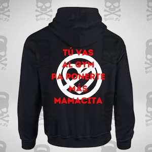 May include: Black hooded sweatshirt with a white circle and red text that says "TÚ VAS AL GYM PA PONERTE MÁS MAMACITA".