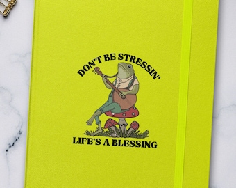 Divertido cuaderno de tapa dura con diseño de rana retro.