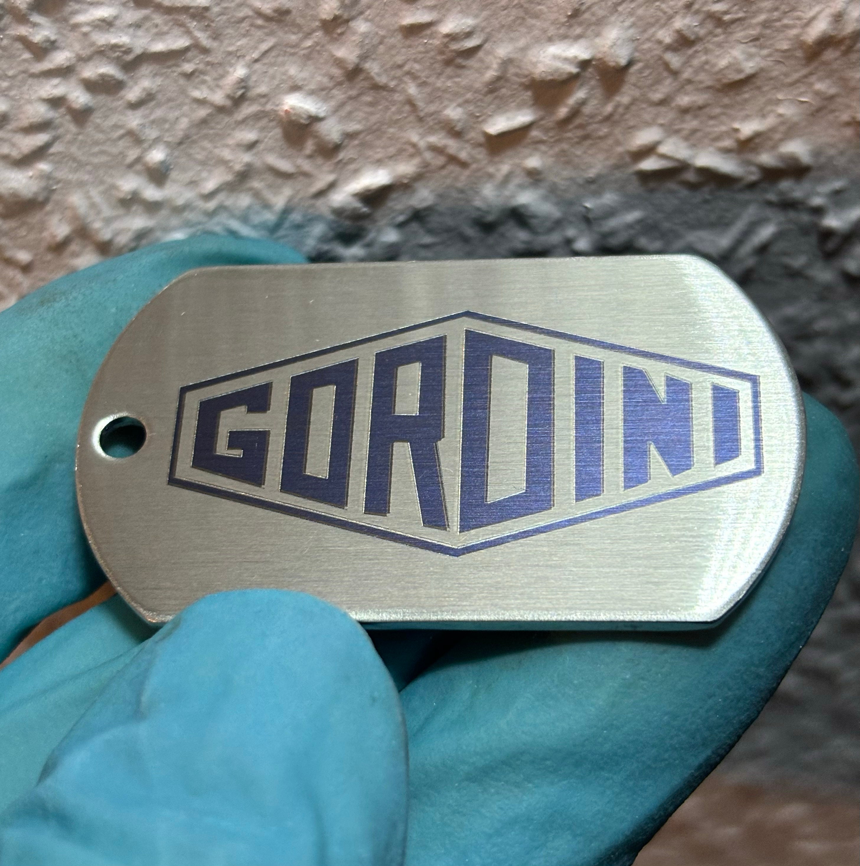Gordini polished stainless steel key ring. Customization available.