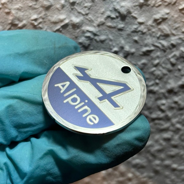 Porte clés rond inox poli miroir Alpine logo d'origine utilisé de 1954 à 1976. Personnalisation sur mesure possible