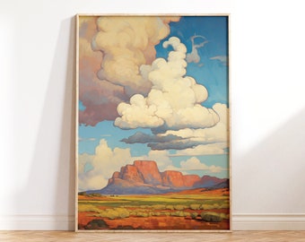 May include: A framed painting of a desert landscape with a large, fluffy cloud in the sky. The landscape is a mix of red, green, and brown colors. The cloud is white and has a light blue sky behind it.