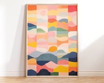 May include: Abstract geometric art print in a wooden frame. The print features a colorful pattern of squares, rectangles, and curved shapes in shades of pink, yellow, blue, green, and orange.