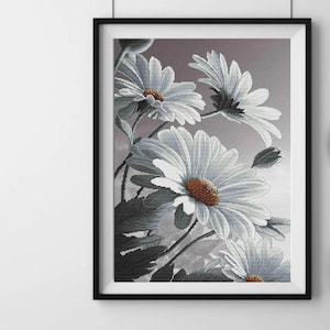 May include: A framed print of a black and white floral still life featuring a bouquet of daisies. The daisies are in various stages of bloom, with some fully open and others still closed. The background is a soft gray.