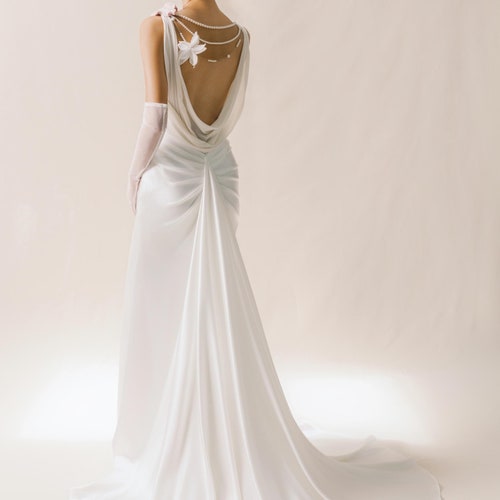 cowl back long sleeve wedding dress Elegant Muslim Long sleeve wedding dresses with Shawl Back, Long Sleeves, and O-Neckline