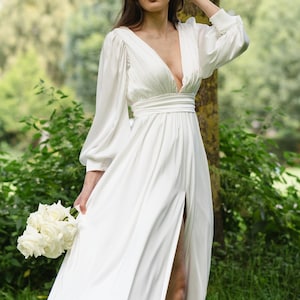 Satin A-Line Wedding Dress: Deep V-Neck, Long Sleeves and Drapping skirt