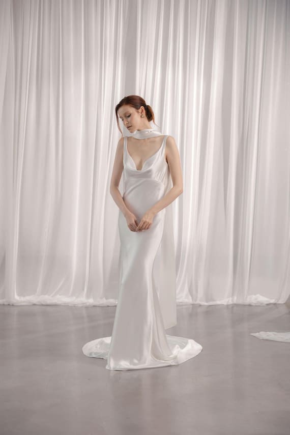Minimalist Simple Satin Wedding Dress with square neck and flower applicants Minimalist Simple Satin Wedding Dress with square neck and flower applicants